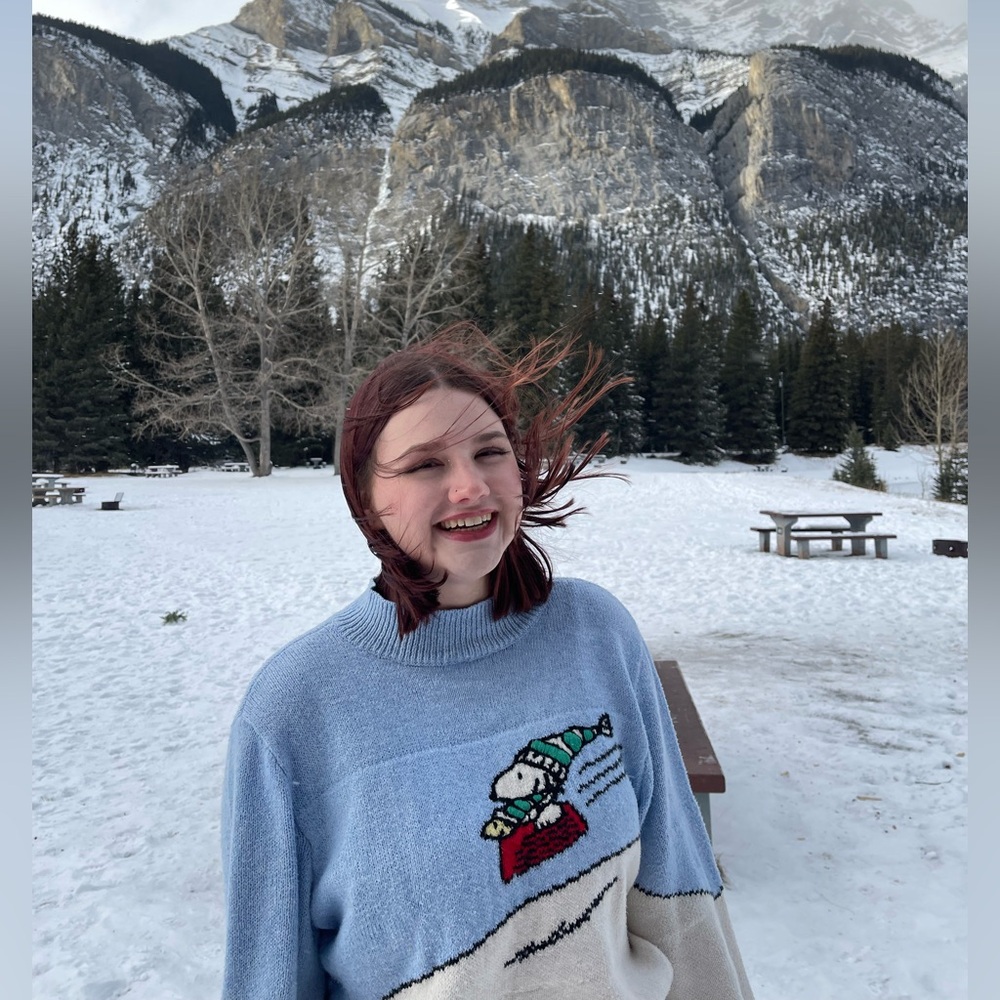 Blue Sweater with Cartoon Design